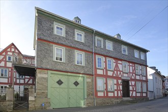 Official pharmacy built in 1805, historic half-timbered house, slate house, Runkel, Westerwald,