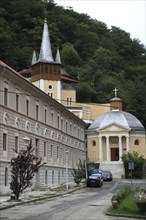 Banat, spa, Hercules bath, Baile Herculane, houses and church in the old town centre, Romania,