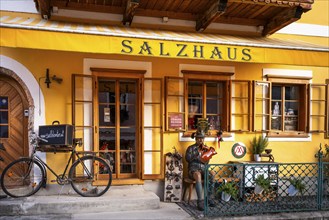 The yellow salt house in Hallstatt. Hallstatt, Gmunden, Salzkammergut, Upper Austria, Austria,