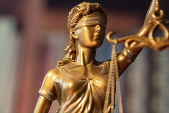 Close-up of a Justitia as a symbol of court judgements, jurisdiction, justice, etc