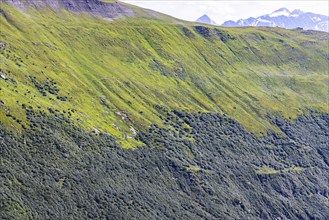 Landscape of the Swiss Alps above the tree line. Mountain slope on the Furka Pass near Obergoms,