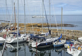 The harbor with leisure boats in Gudhjem, Bornholm, the Baltic Sea, Denmark, Scandinavia, Europe