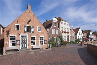 Gabled houses in Greetsiel fishing harbour, Krummhörn, East Frisia, Lower Saxony, Germany, Europe