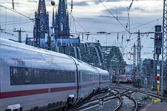 ICE train on the track in front of Cologne Central Station, Hohenzollern Bridge, Cologne Cathedral,