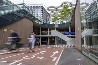 Entrance and exit of the bicycle car park at Utrecht Centraal station, Stationsplein, over 13, 000