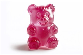 Cute opink jelly bear fruit gum candy on white background. Generative Ai, AI generated