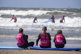 Course for surfers, surfing beginners, on the beach of Scheveningen, Netherlands