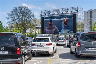 Temporary drive-in cinema, in the car park in front of Messe Essen, Grugahalle, large LED screen