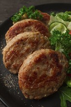 Fried cutlets, turkey, with vegetable salad, top view, no people