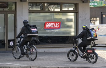 Bicycle courier from the fast delivery service Gorillas, delivers groceries, currently in over 20