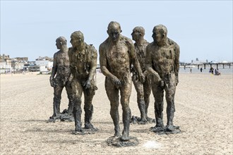 'Walking Men' artwork bronze sculptures by Laurence Edwards, South Beach, Lowestoft, Suffolk,