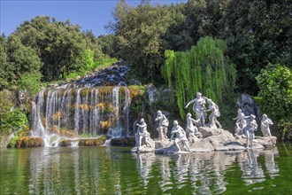 Fountain sculptures at the water basins in the garden of the royal palace Palazzo Reale, Italian