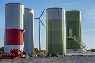 Construction site of a new wind turbine, modules of the tower, wind turbine from the manufacturer