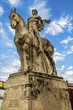 Equestrian statue for fallen soldiers in the Piazza della Republica, medieval old town centre,