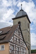 Medieval half-timbered house and the tower of the Protestant parish church, Betztenstein, Upper