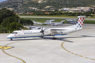 A De Havilland Canada Dash 8 Q400 aircraft of Croatia Airlines with registration 9A-CQF at Split