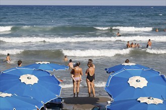 Families with children on the beach of Diano Marina, Italy, 14/08/2024, Diano Marina, Liguria,