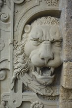 Lion's head at the gate portal, lower castle gate, stone figure, restored sculpture, relief,