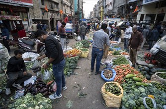 Vendor selling vegetables at a market, ahead of the presentation of the Interim Budget 2024 by