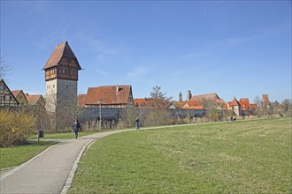 Bäuerlinsturm as part of the historic town fortifications, town wall, footpath with walkers,