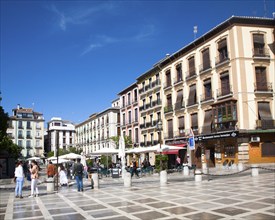 People and buildings in Plaza Neuva, Granada, Spain, Europe