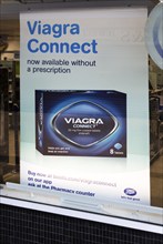 Boots chemist shop window Viagra Connect advertising poster, Calne, Wiltshire, England, UK