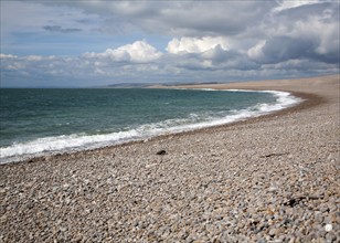 Sweeping bay and shingle beach of Chesil Beach from Chiswell, Isle of Portland, Dorset, England, UK