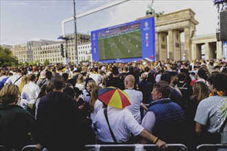 Fans react during the European Championship preliminary round match between Germany and Hungary on