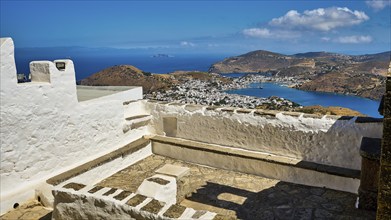 Architectural viewpoint overlooking the sea and coast under a clear sky, Agiou Theologou Monastery,