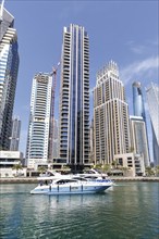 Yachts at Dubai Marina Skyline High-rise buildings Real estate Skyscrapers Luxury wealth in Dubai,