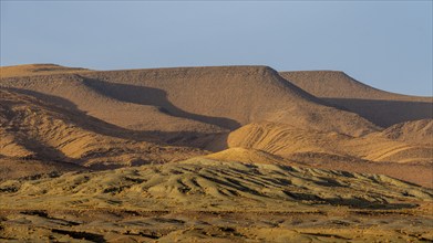 Mountain and hilly landscape in the evening light, sandstone hills, Fint, Morocco, Africa