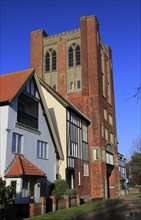 Eccentric mock Tudor architecture of water tower and houses, Thorpeness, Suffolk, England, UK