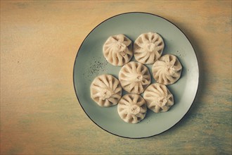 Traditional Georgian dish, Khinkali, Kalakuri, top view, rustic style, no people