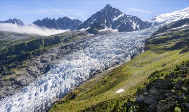 Mountain landscape with glacier Glacier des Bossons and summit of the Aiguille du Midi, Chamonix,