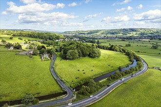 Farms and Fields over Cononley and River Aire from a drone, Keighley, North Yorkshire, England,