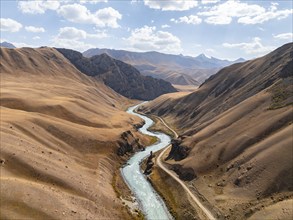 Mountain valley with wild river between hills, Bolgart Valley, Naryn Province, Kyrgyzstan, Asia