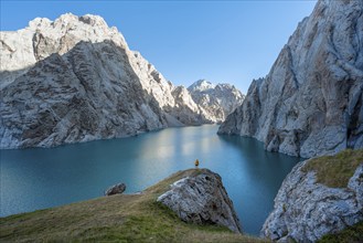 Hiker in front of Kol Suu Mountain Lake, Kol Suu Lake, Sary Beles Mountains, Naryn Province,