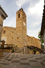 Stork nest on church tower at Almonaster La Real, Sierra de Aracena, Huelva province, Spain, Europe