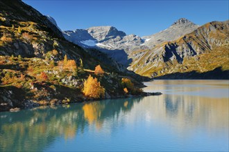 Autumn colours at Lac d'Emosson in the Valais mountains, Switzerland, Europe