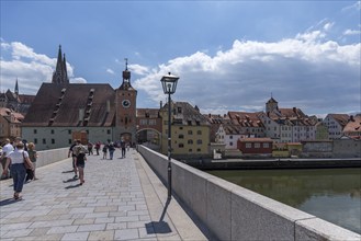 Restored Stone Bridge with city skyline, Regensburg, Upper Palatinate, Bavaria, Germany, Europe