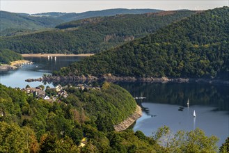 View from above the village of Woffelsbach, to the east, of Lake Rursee, Eifel National Park, North