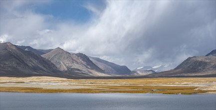 Mountain lake in the high mountains, Ak Shyrak Mountains, near Kumtor, Kara-Say, Tian Shan,