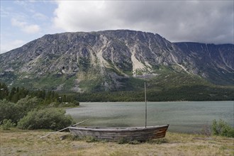 Old boat on the shore of Bennett Lake, Chilkoot Trail, Gold Rush, Yukon Territory, Canada, North