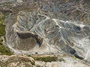 Rugged rocks and valleys in a dry, hot landscape, aerial view, Tabernas desert, Desierto de