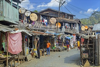 Street with shops and wooden houses in the town Andasibe Gara, Moramanga district, Alaotra-Mangoro