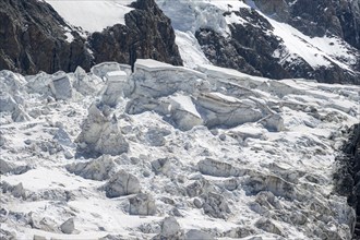 Rutted glacier ice with crevasses, high alpine mountain landscape, La Jonction, Chamonix,