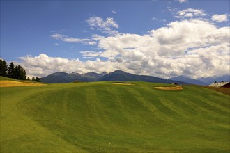 Crans Sur Sierre Golf Course with Hole 7 and Mountain View in Crans Montana in Valais, Switzerland,