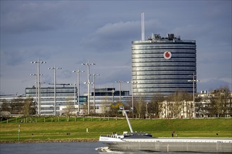 The Rhine near Neuss Vodafone building, cargo ship, North Rhine-Westphalia, Germany, Europe