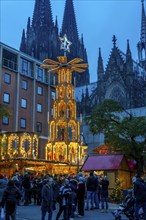 Christmas market at Roncalli Platz am Dom, in the city centre of Cologne, Sunday shopping in