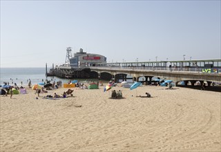 The pier and sandy beach at Bournemouth, Dorset, England, UK